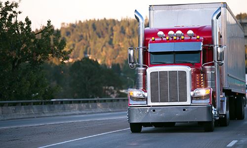 Semi-truck driving on road